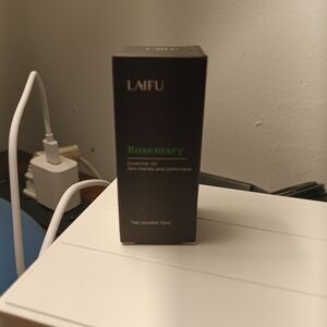 Rosemary Essential Oil - Green and Black Bottle